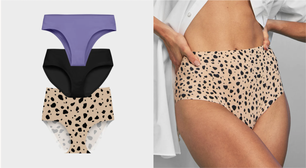  Purple thong, black briefs, and high-waisted patterned underwear layered on each other with a woman posing in the high-waisted patterned print and white button-up.