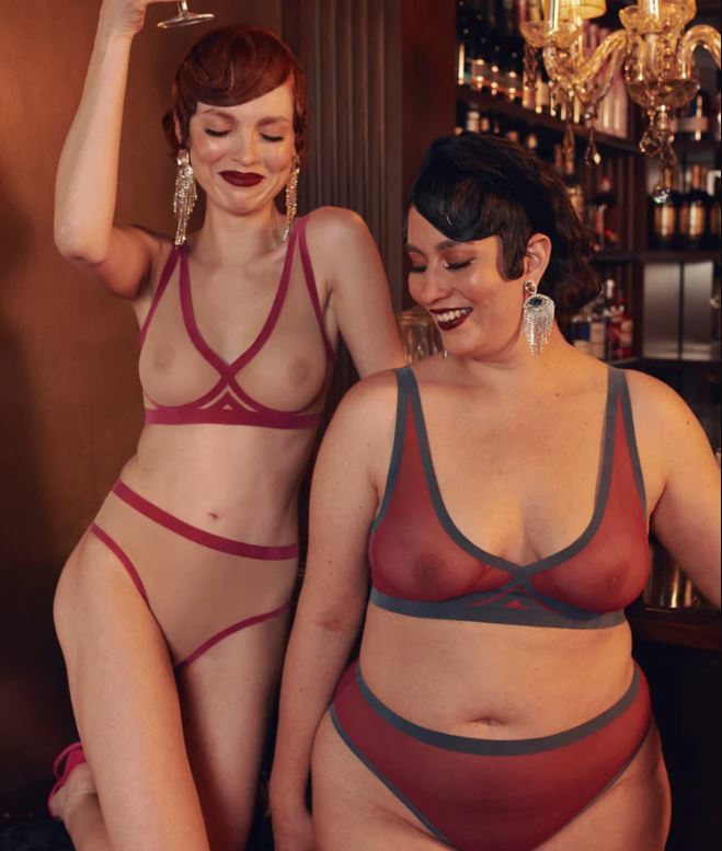 two models wearing red sheer bralettes by EBY