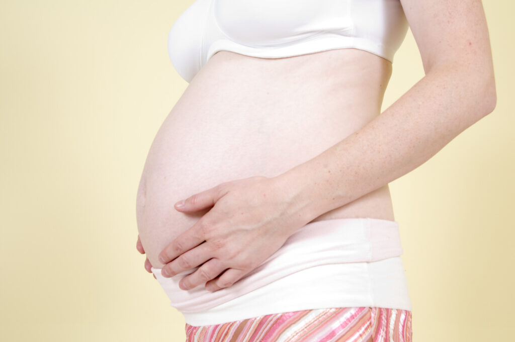 pregnant model wearing maternity bras